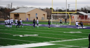 Penalty kick.  Logan is on the right - white jersey #2.  I swell with pride when he pushes other players!  